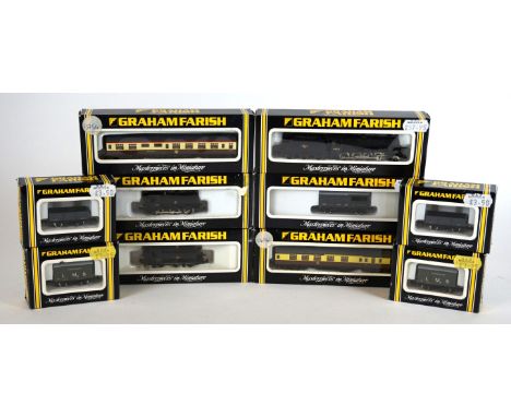 Twenty-three boxed 'N' gauge railway items
Comprising four Graham Farrish locos, no. 1905, 1505, 1115 and 1105, two Graham Fa