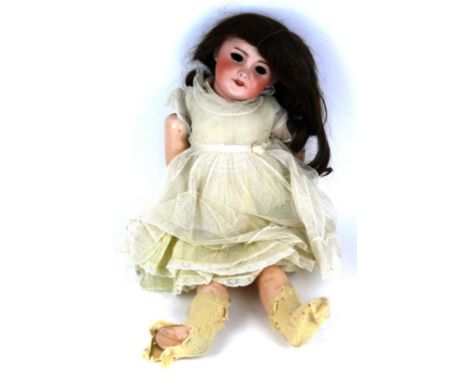 A French bisque headed doll 
With dark brown wig, open/closed brown eyes, open mouth, impressed mark SFPJ 301 Paris 10, with 