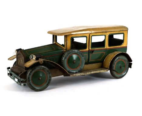 A Wells Marks & Spencer issued tinplate car
Produced in the 1930s for sale in Marks & Spencer's shop - green with cream roof 