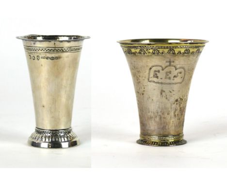 A German silver beaker, marked to base, indistinct
Of tapered form, with a fluted circular foot, inscribed with E.E.S, height