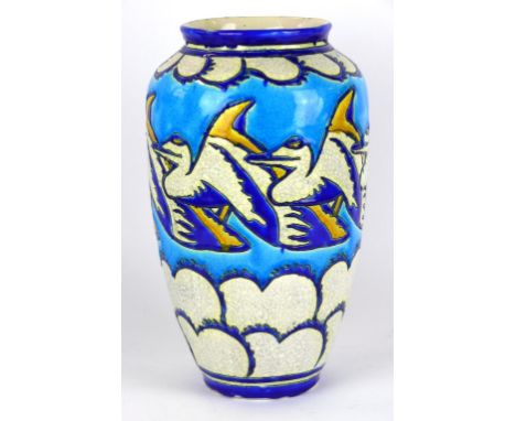 An Art Deco style Boch Freres vase of cylindrical form
Decorated with flying birds on a turquoise and white crackle glazed gr