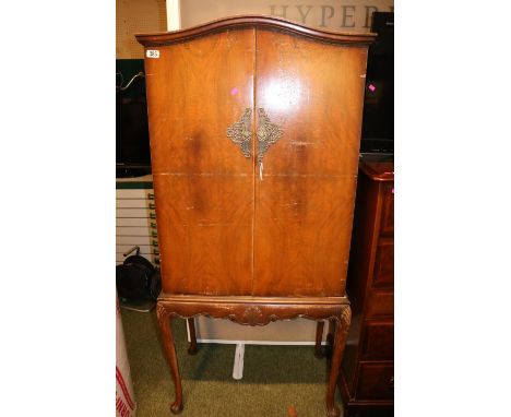 Walnut Drinks cabinet with fitted interior over long cabriole legs 