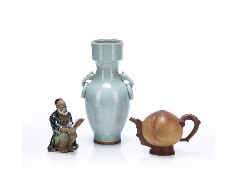 Group of piecesChineseto include a celadon crackle glaze vase with ring handles, 29cm high, a glazed model of a scholar, 14cm