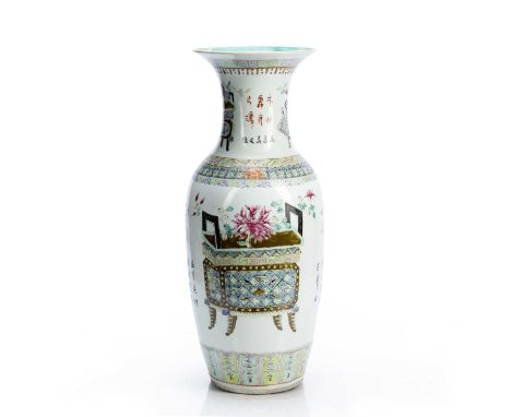 Canton polychrome porcelain vaseChinese, early 20th Centurypainted with a two jardinieres of flowers, and with inscription, 5