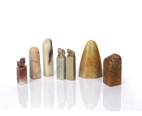 Group of hardstone seals Chinese, 20th Centurycomprising of five vertically shaped ones and two boulder shaped seals, tallest