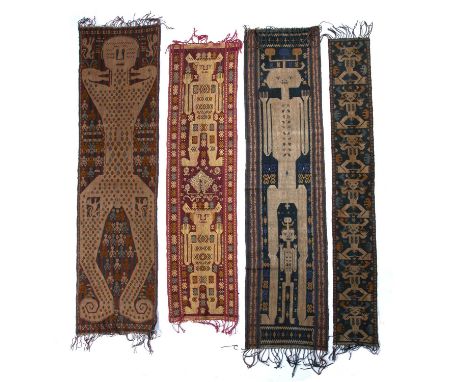 Collection of Sumba island clothsIndonesiacomprising of an ikat decorated cloth decorated with Devil like creatures and anima