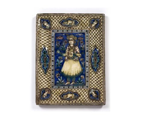 Qajar polychrome tilePersia, late 19th Centurywith a figure to the central panel, and with raised panels to the moulded borde