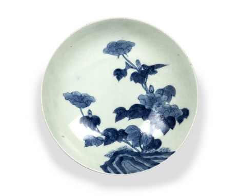 Blue and white Nabeshima dishJapanese, 18th/19th Centurydecorated two sprays of peony flowers rising from a small rock cluste