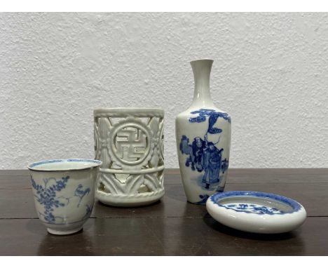 White glazed brush potKoreanwith leaf and swastika symbols, 10cm diameter x 13cm high, a blue and white vase painted with sch