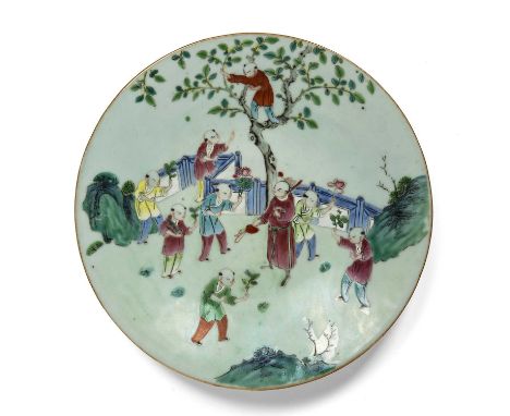 Celadon dishChinese, circa 1900painted with an attendant and children playing in a garden, 29cm diameterSome light firing fau