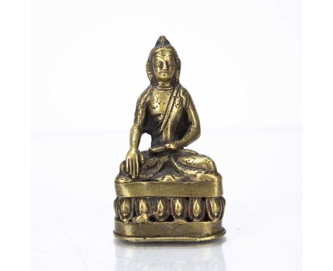 Bronze figure of  BuddhaTibetan, 18th Centuryon an open work multilobed base 9.5cm highScuffs and bumps with age