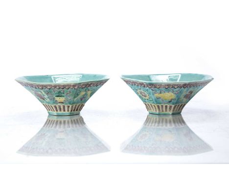 Pair of turquoise glazed octagonal bowlseach with panels of auspicious subjects, impressed Kangxi marks, 14cm wide x 5.5cm hi