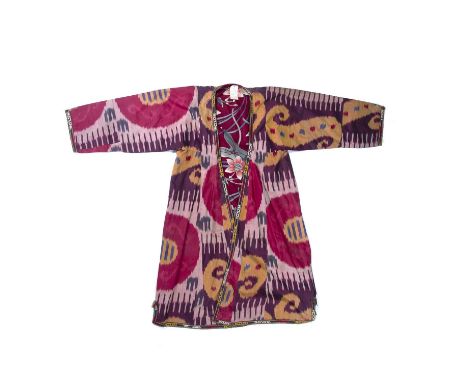 Ikat decorated chapan Uzbekistan, late 19th Centurydecorated in typical tie-dyed colours, decorated to the interior with flow