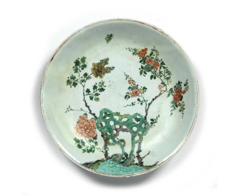Famille verte charger Chinese, Kangxi perioddecorated with a rocky outcrop to the centre with flowering branches growing out 