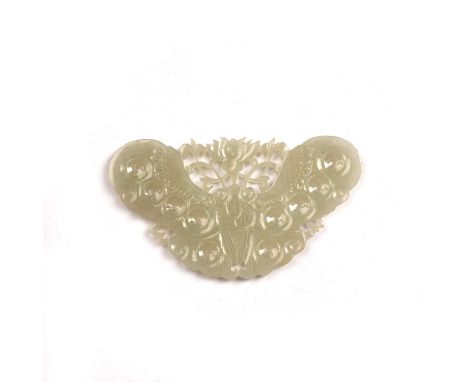 White jade plaqueChinese, late 18th Centurycarved as an open winged butterfly hovering by a flowerhead, the reverse cut with 