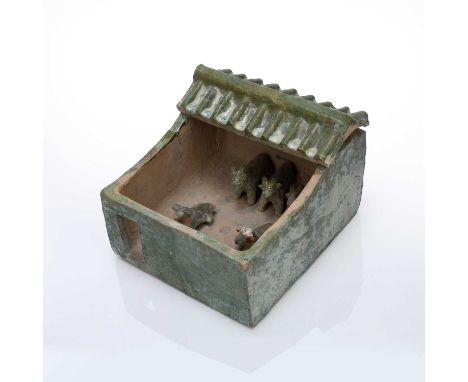 Pottery model of a pigstyChinese, possibly Eastern Han dynastythe black ceramic model with two privies leading into a pen whe