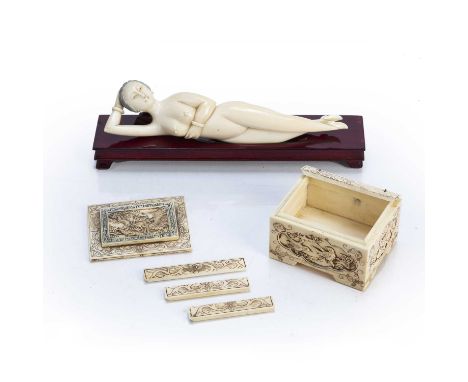 Ivory doctor's model Chinese, early 20th Centuryon a wood stand, figure 20cm long and a small carved Chinese casket, 8cm x 6c