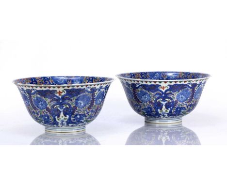 Pair of polychrome porcelain deep 'dragon' bowlsChinese, 19th Centuryeach with green circular panel to the centres, and iron 