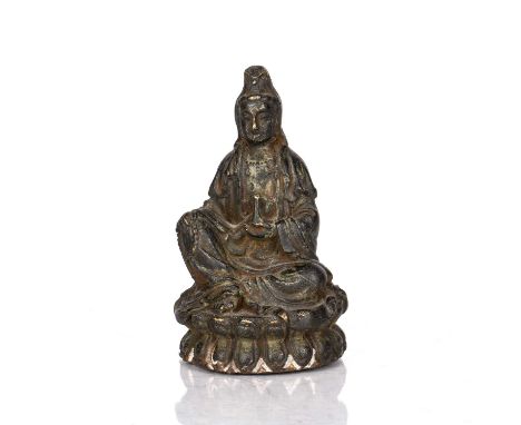 Bronze figure of GuanyinChinese, late Ming dynastyholding a ritual water bottle (Kundika) in the left hand and prayer beads i