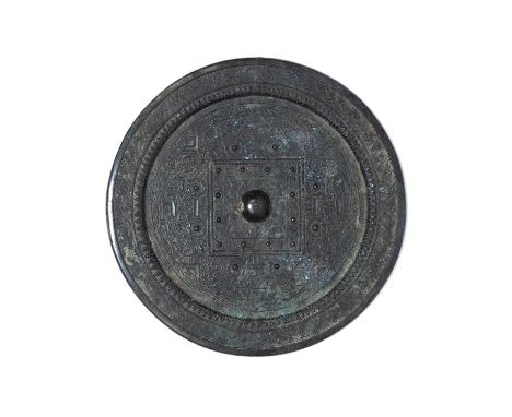 Bronze TLV mirrorChinese, Western Han Dynastyoriginally cast in two sections, back is cast mandala like form with a knob cent