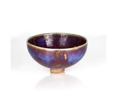 Large purple jun glaze bowlChinese, Song or Ming dynastycovered in a deep purple glaze with splashes of blue, 18cm across x 9