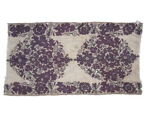 Silk panel/fragmentAlgerian, 18th Centurywith purple and green foliate designs, 74cm x 43cm Some holes, fraying to the edges 
