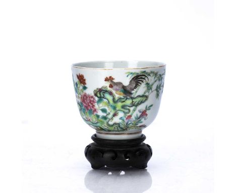 Large famille rose 'chicken' cupChinese, 19th Centurypainted with rockwork, cockerel, bamboo and peonies, on a later stand 8c