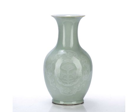 Celadon vaseChinese, early 20th Centurywith dragon and ruyi bianco sopra bianco decoration, 32cm highDrilled to the base for 
