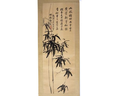 20th Century Chinese Schoolhanging scroll painted with bamboo and calligraphy, signed with a red seal, 88cm x 31cm in a stora