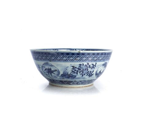 Blue and white porcelain punch bowlChinese, 19th Centurypainted to the exterior with panels of figures and landscapes, with K