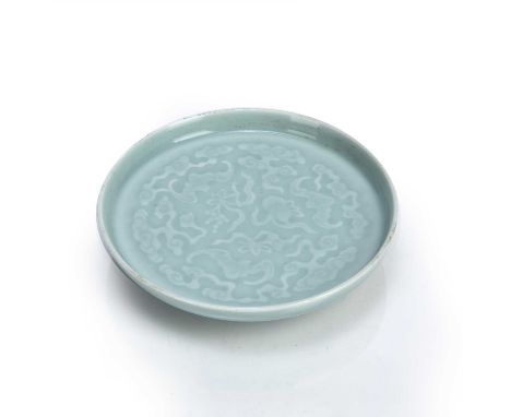 Pale celadon pedestal dishChinese, 19th Centurywith relief moulded decoration of bats, and clouds to the top, and ruyi design