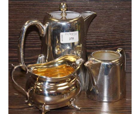 SILVER PLATED THREE PIECE TEA SERVICE
and another four piece tea service