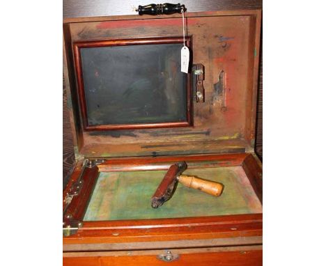 EARLY 20TH CENTURY WOODEN CASED PRINTING KIT
with rolling block, screenprint holder and roller within a teak case, 51cm long
