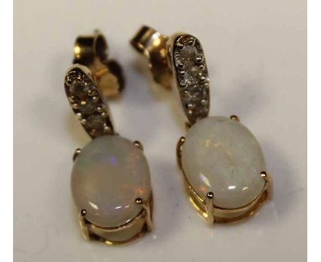 PAIR OF OPAL DIAMOND EARRINGS
each set wtih an oval opal below  a row of diamonds