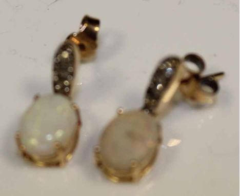 PAIR OF OPAL DIAMOND EARRINGS
each set wtih an oval opal below  a row of diamonds