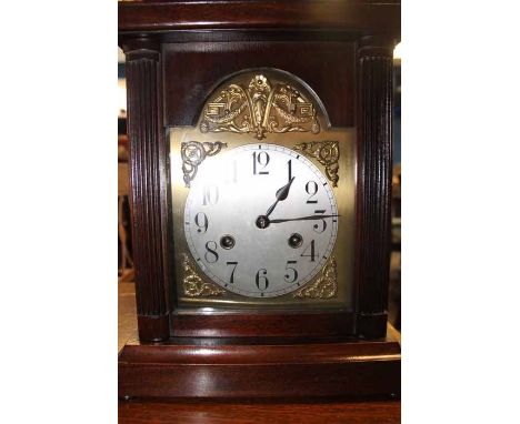 JUNGHAN'S MANTEL CLOCK 
the dial with gilt detailing, 44cm overall (including bracket)