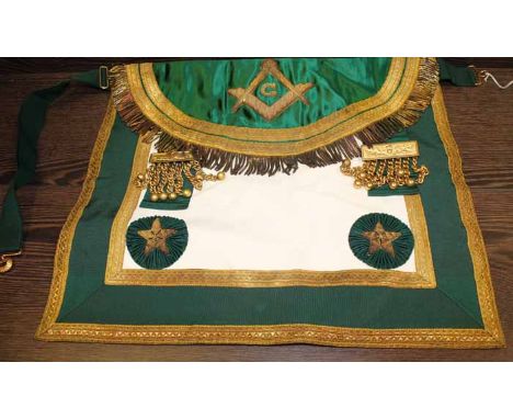 GREEN AND GOLD MASONIC APRON
with letter G inside compass and set square to front,  40cm wide

