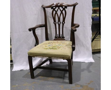 A 19h century mahogany framed gentlemans elbow chair in the Chippendale manner, with Berlin style woolwork seat. Not availabl