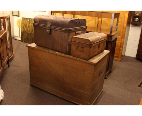 Large pine trunk, 79cm by 127cm by 63cm, and two tin trunks (3).