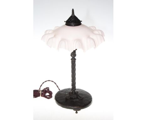 Art Nouveau period cast metal column table lamp with pink opaque fancy shade, 44cm.