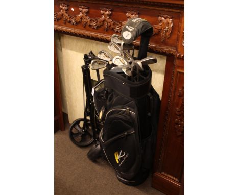 Golf bag, caddy and set of twelve golf clubs including Callaway Big Bertha.