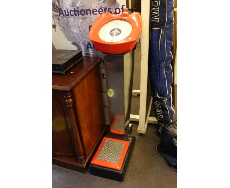 Coin operated personal scales.