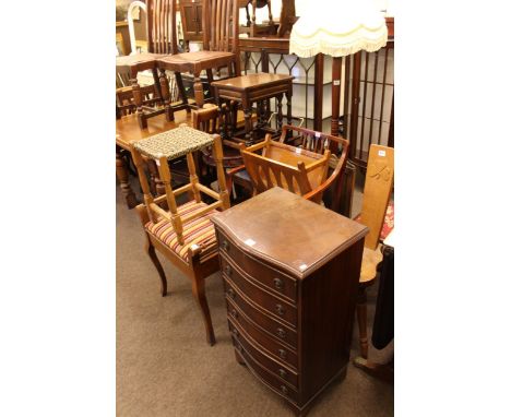 Slim mahogany serpentine front chest of six drawers, piano stool magazine rack, stool, standard lamp, elbow chair, drinks tro
