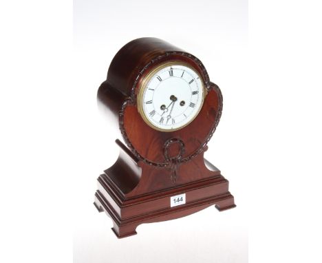 Mahogany balloon shaped mantel clock, 34cm high.