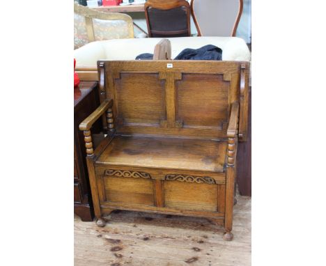 Oak Monks bench with bobbin supports, 71cm by 81cm by 48cm (closed).