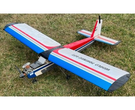 A large scale scratch built RC Radio Controlled model plane. ' World Trainer 40-T '. Light weight wooden frame with a vinyl c