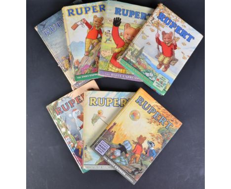 A collection of x7 vintage 1960s /1970s Daily Express Rupert The Bear annuals. Hardback examples containing x10 short stories