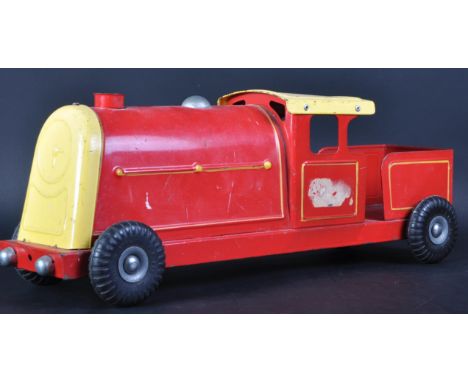 A vintage 1950s Triang / Tri-ang Lines Bros pressed tinplate Express Train Locomotive. Red body with yellow trim and original