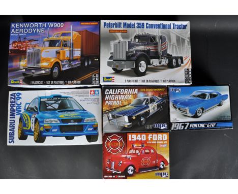 A collection of x6 assorted plastic model kits of various scales and makers to include; MPC 1/25 scale Pontiac GTO, Tamiya 1/
