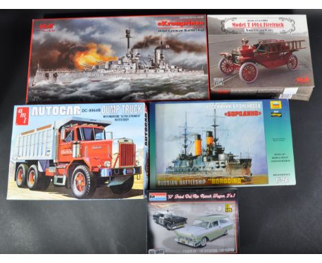 A collection of x5 assorted plastic model kits of various scales and makers to include; ICM 24004 1/24 scale 1914 Fire Truck,